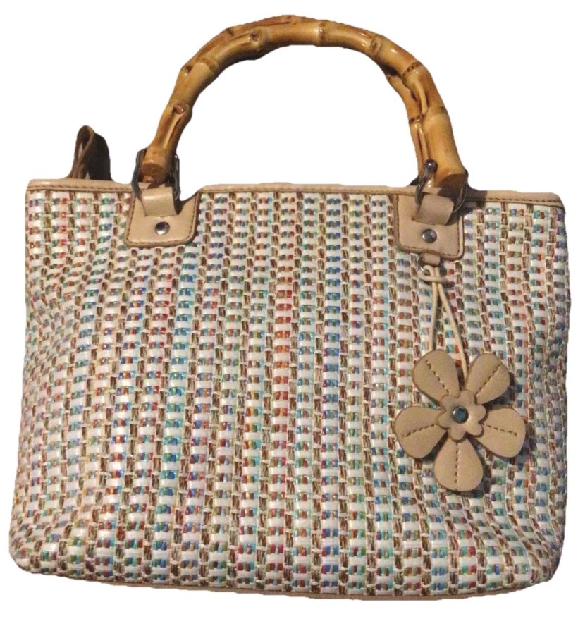 Close-up of relic handbag leather texture and gold-tone hardware